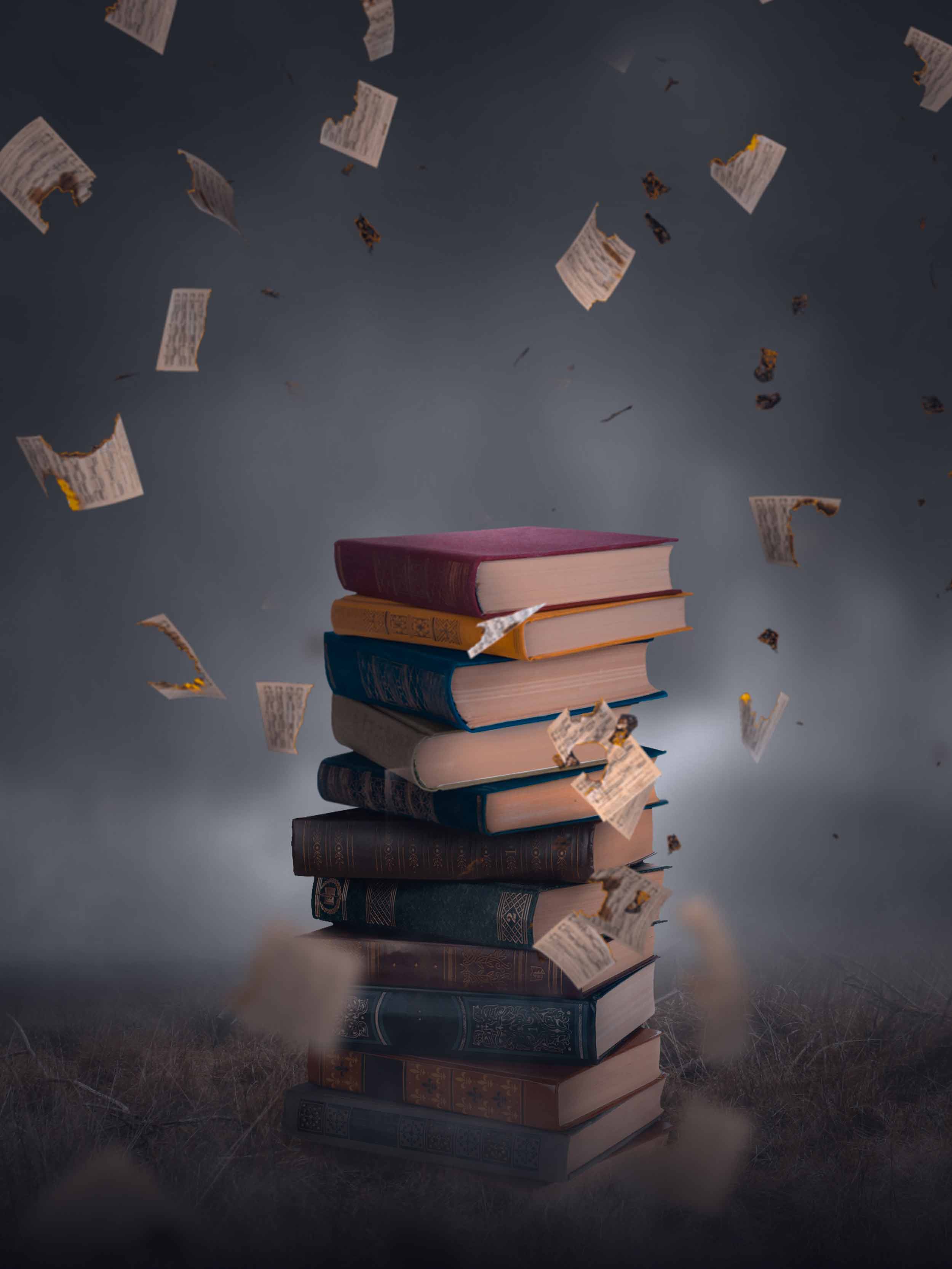 Book and Flying Paper Free Stock Background Image